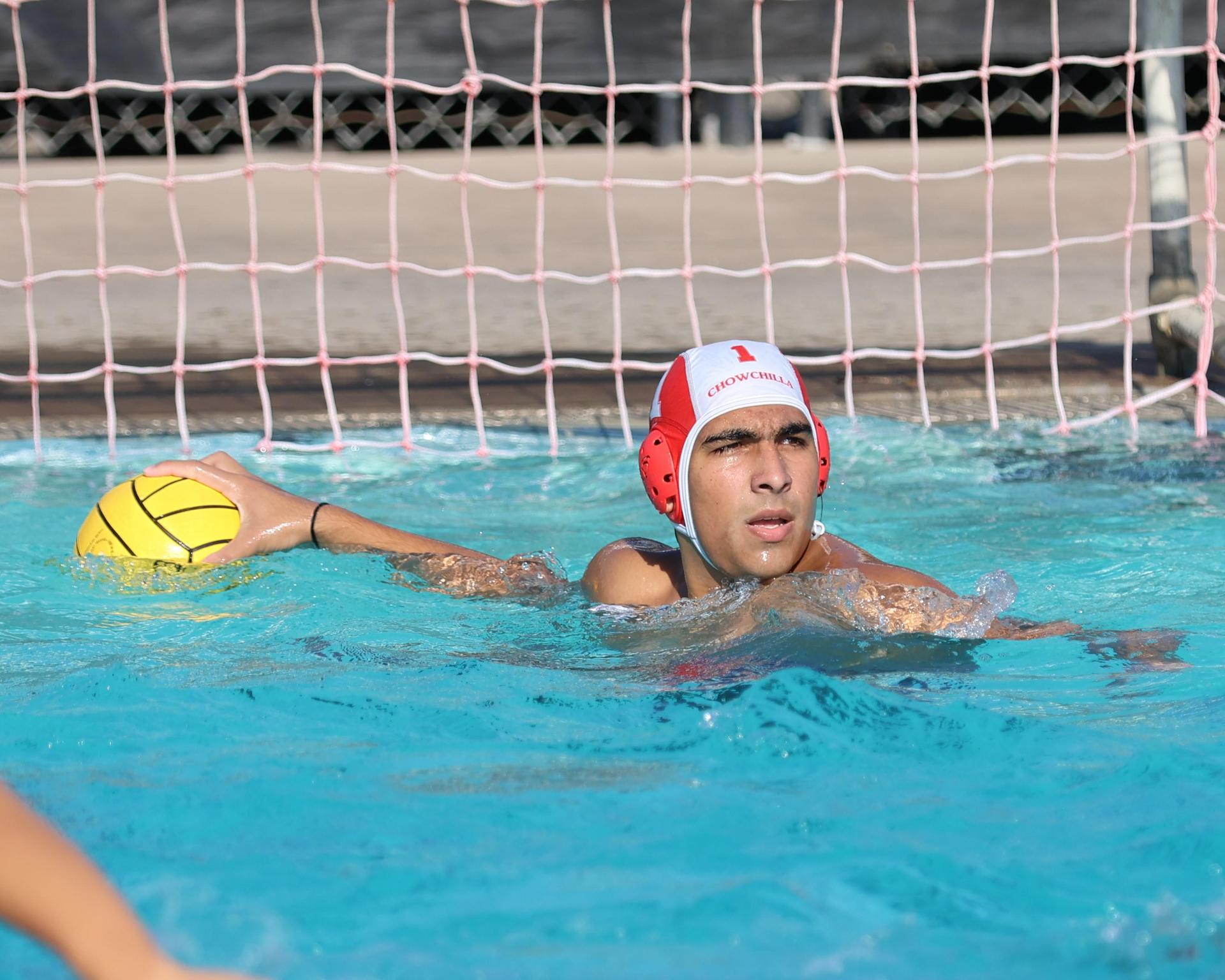 Boys playing water polo against Yosemite