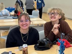 two students attending the Open House