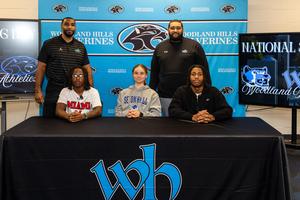 Annabel, Scoop, and Ziggy pose with Ty Brown and Jullian Turner