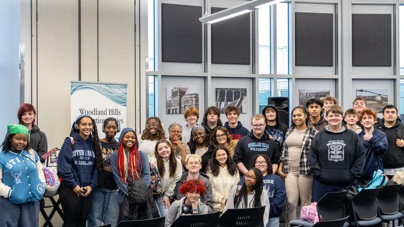 Sharon Flake poses with the students