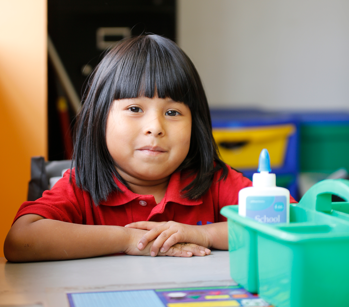 Smiling children together outdoors.