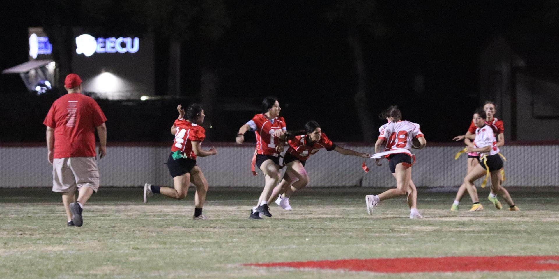 girls playing flag football