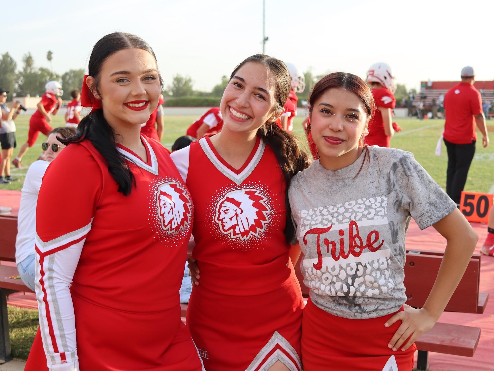 junior varsity cheerleaders in action at the Riverdale game