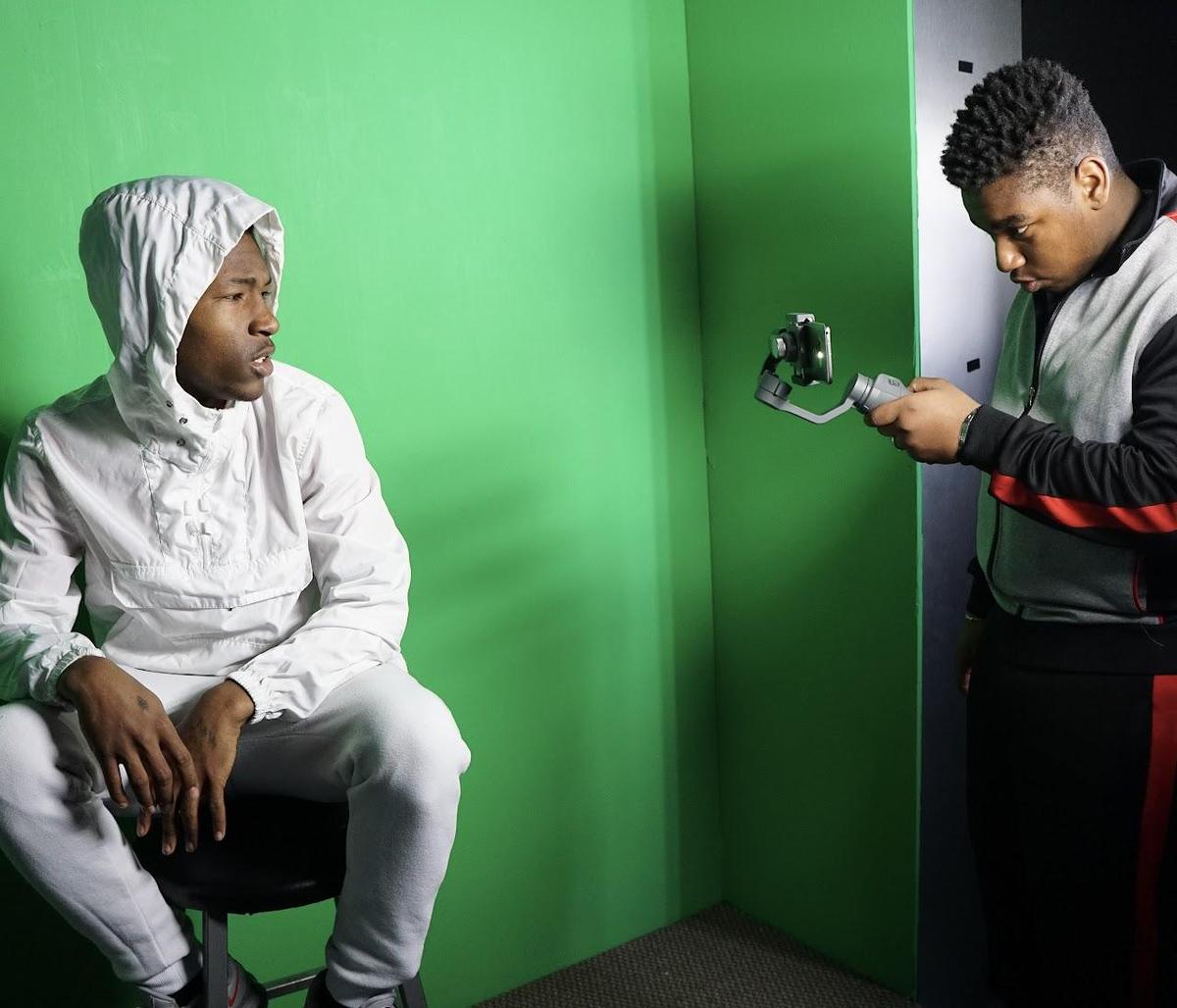 student using video camera