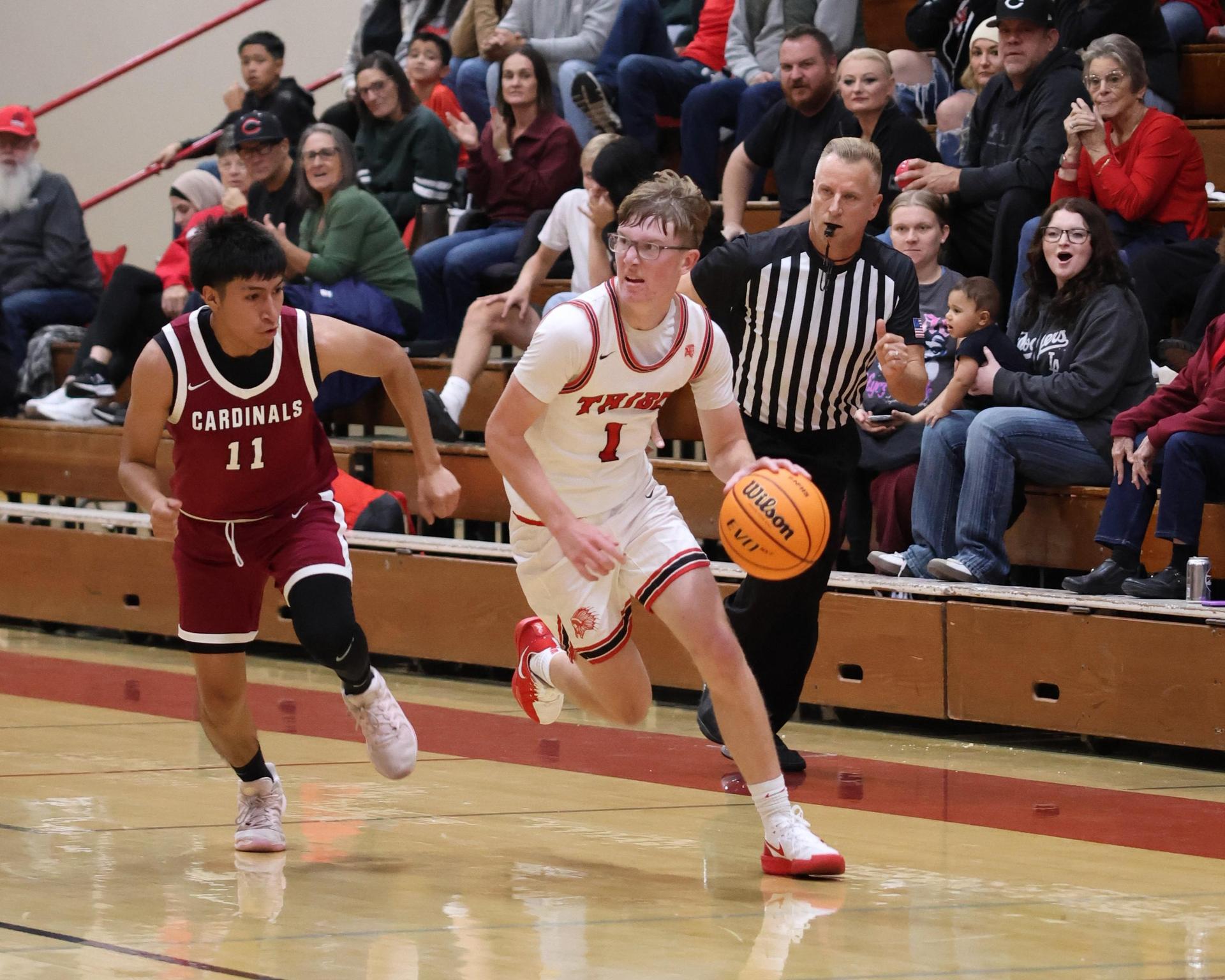 Varsity Boys Basketball playing vs. Orosi 50