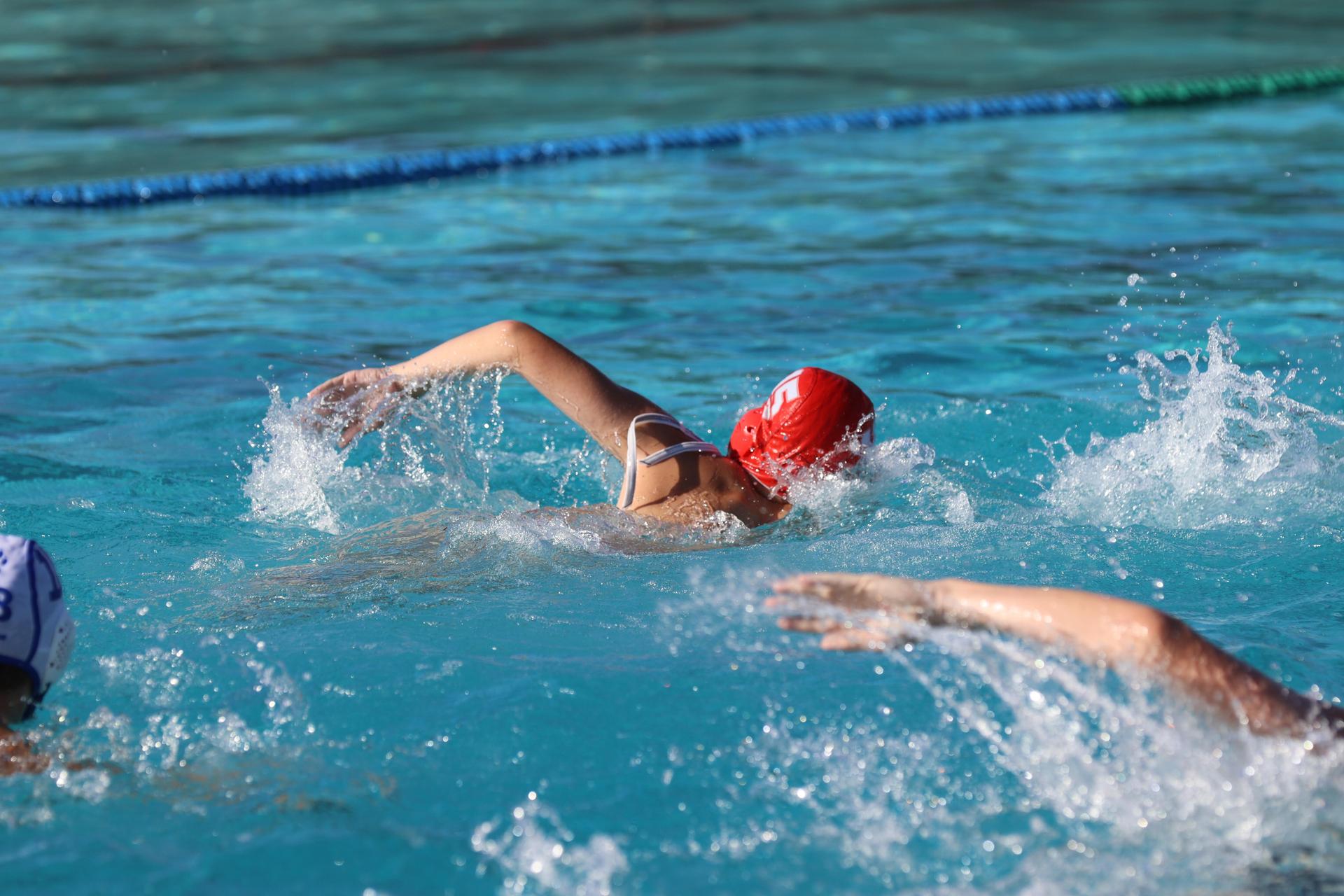 boys playing water polo against Madera