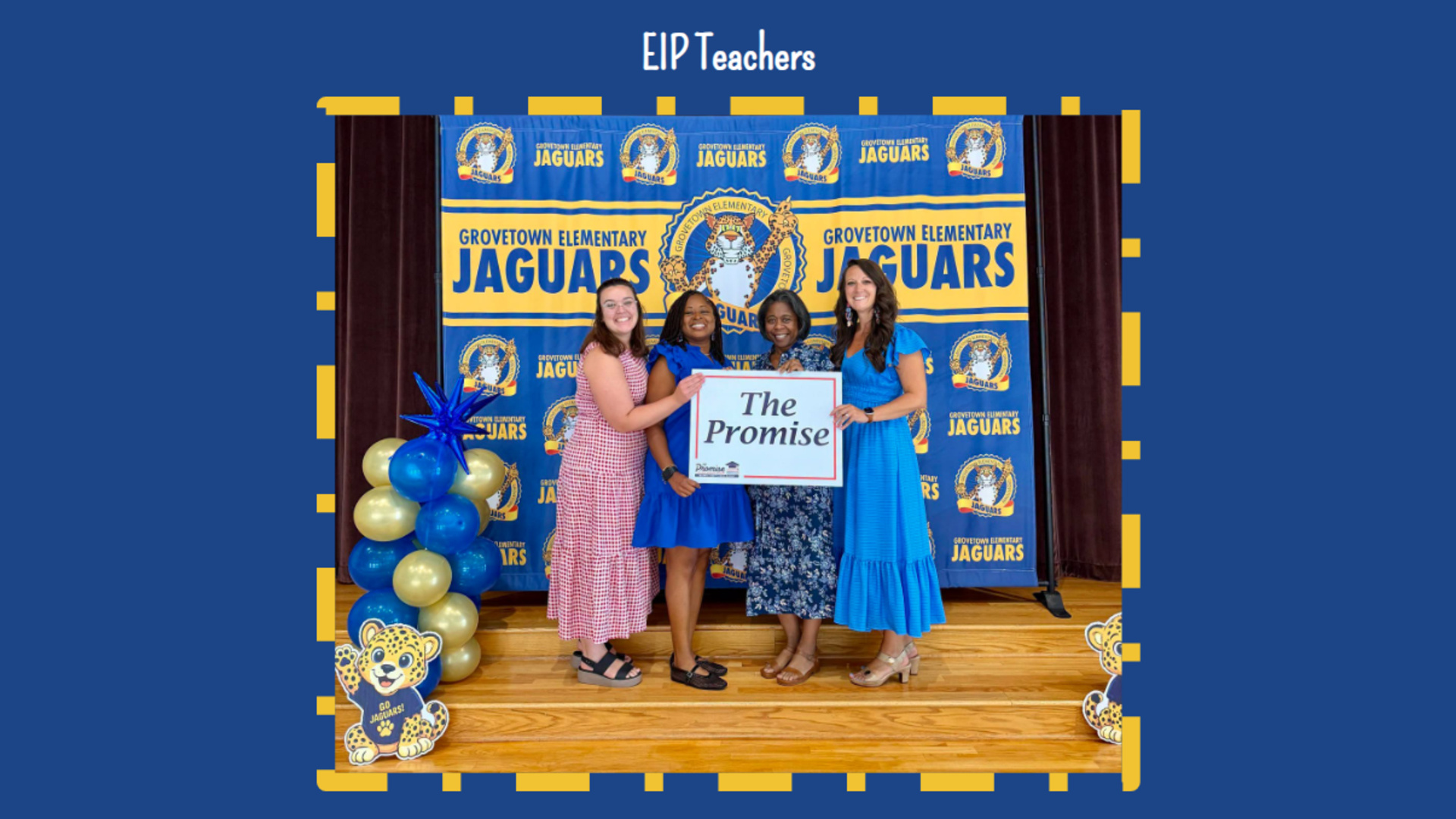 EIPT teachers standing together with a sign that says 'The Promise'.