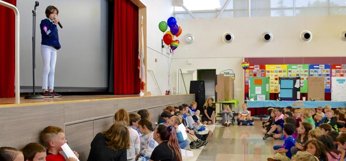 Singer at 5th Grade IB Exhibition assembly
