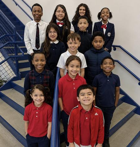 LHS students standing on the staircase.