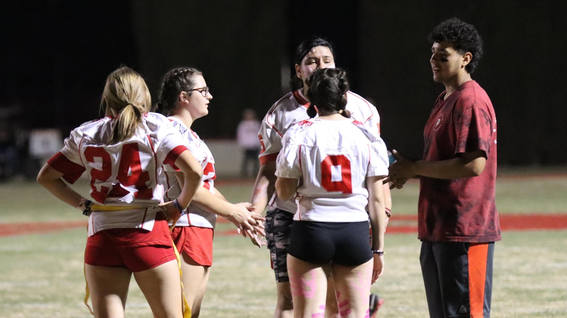 girls playing flag football