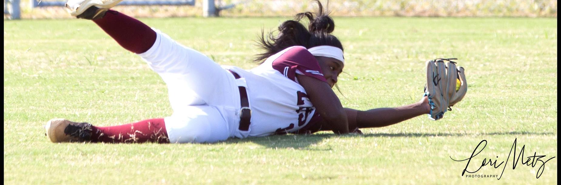 Softball Player Catching the Ball