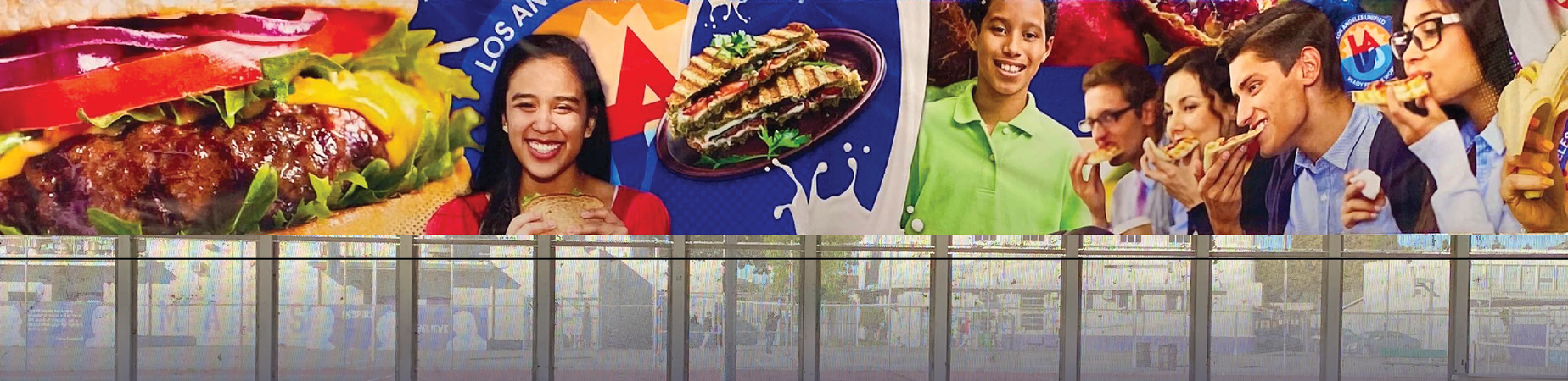 School lunch area and a banner of food and students eating.