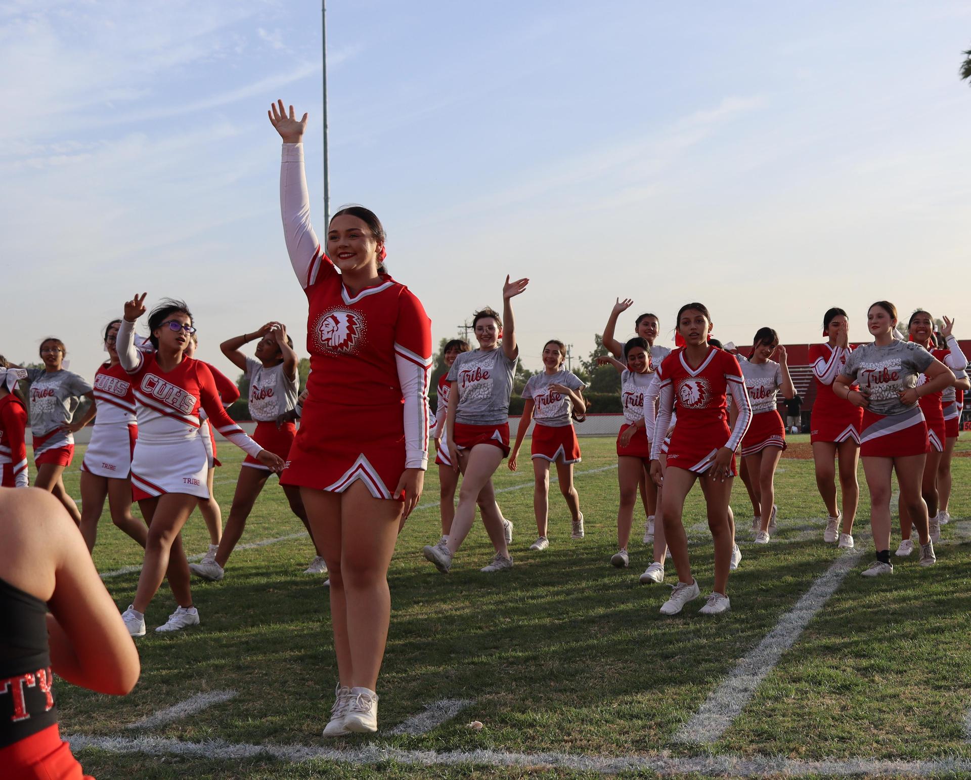 Cheerleaders performing at the football game