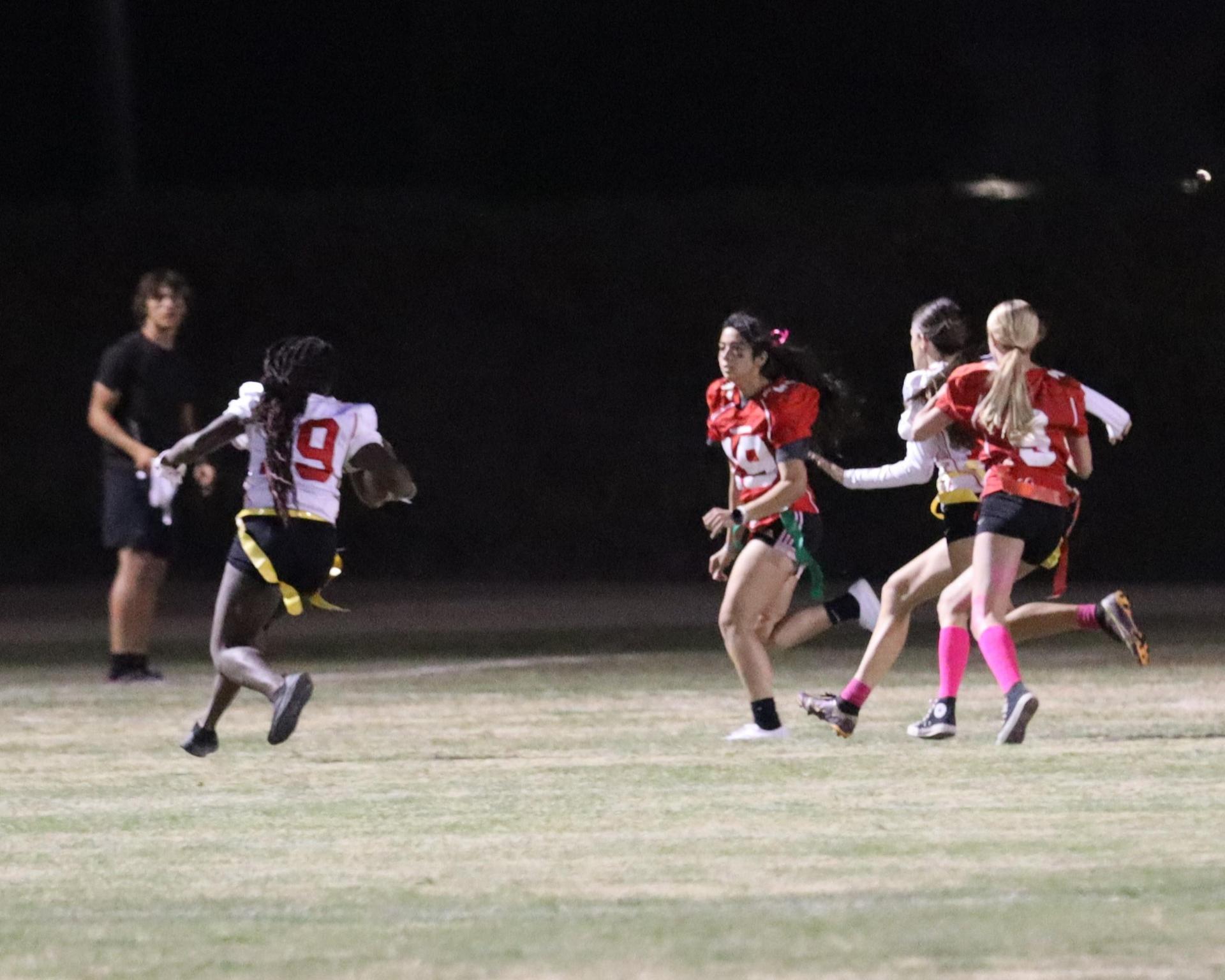 girls playing flag football