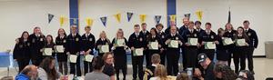 Group of FFA members showing off their Greenhand Degrees.