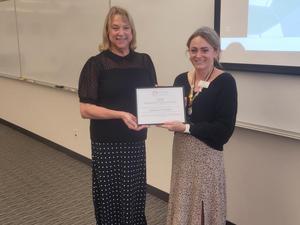 Jeana Lam-Pickett with Trustee Petrino holding certificate