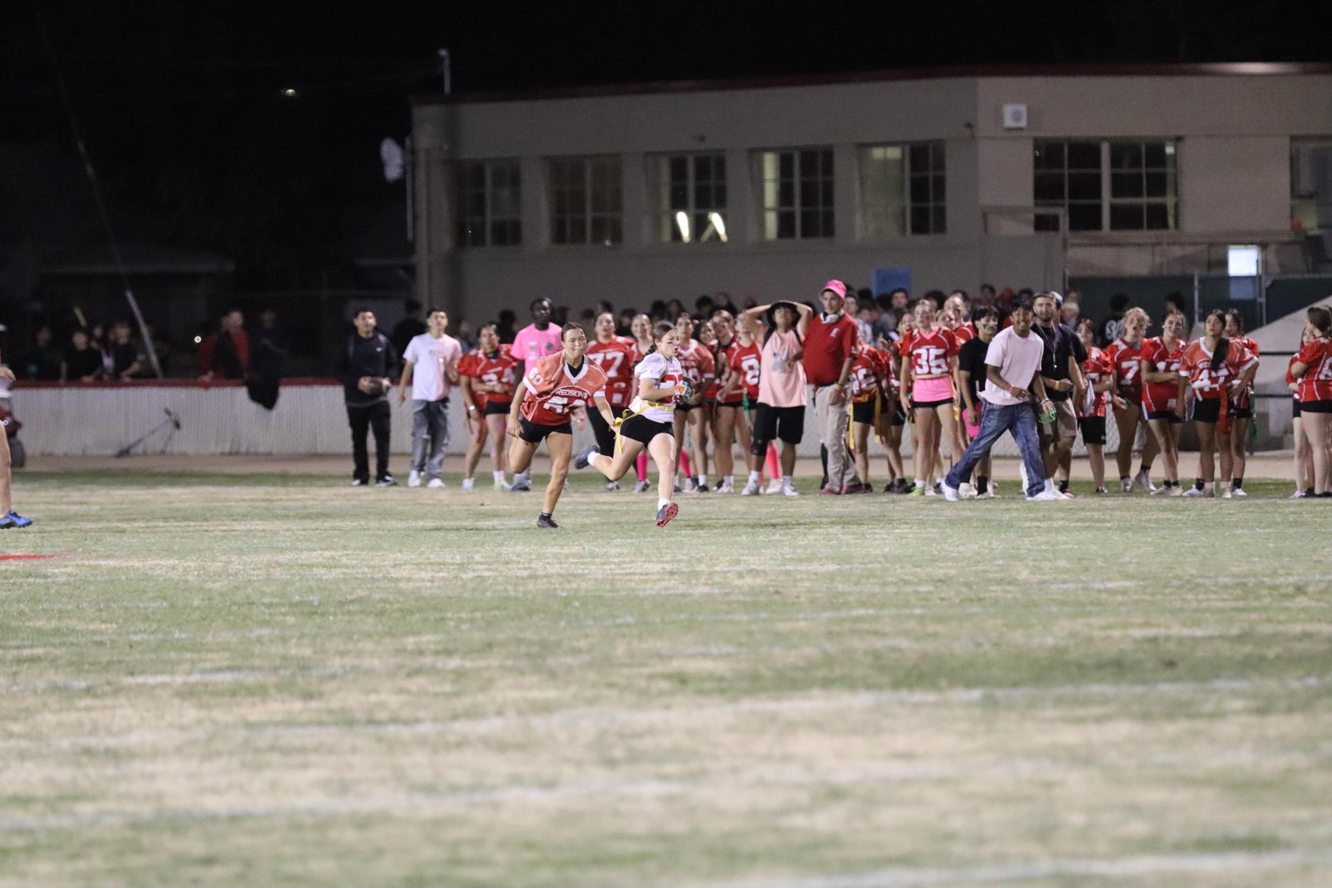 girls playing flag football