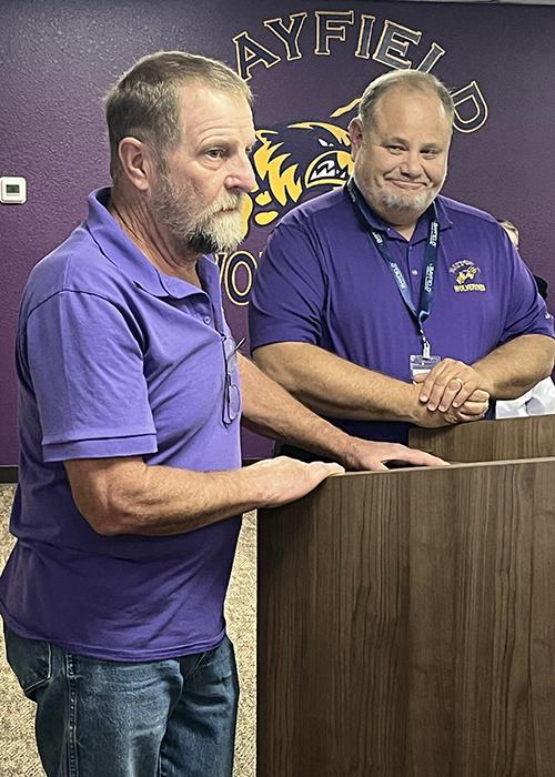 The mayor and town manager present a proclamation to the board.