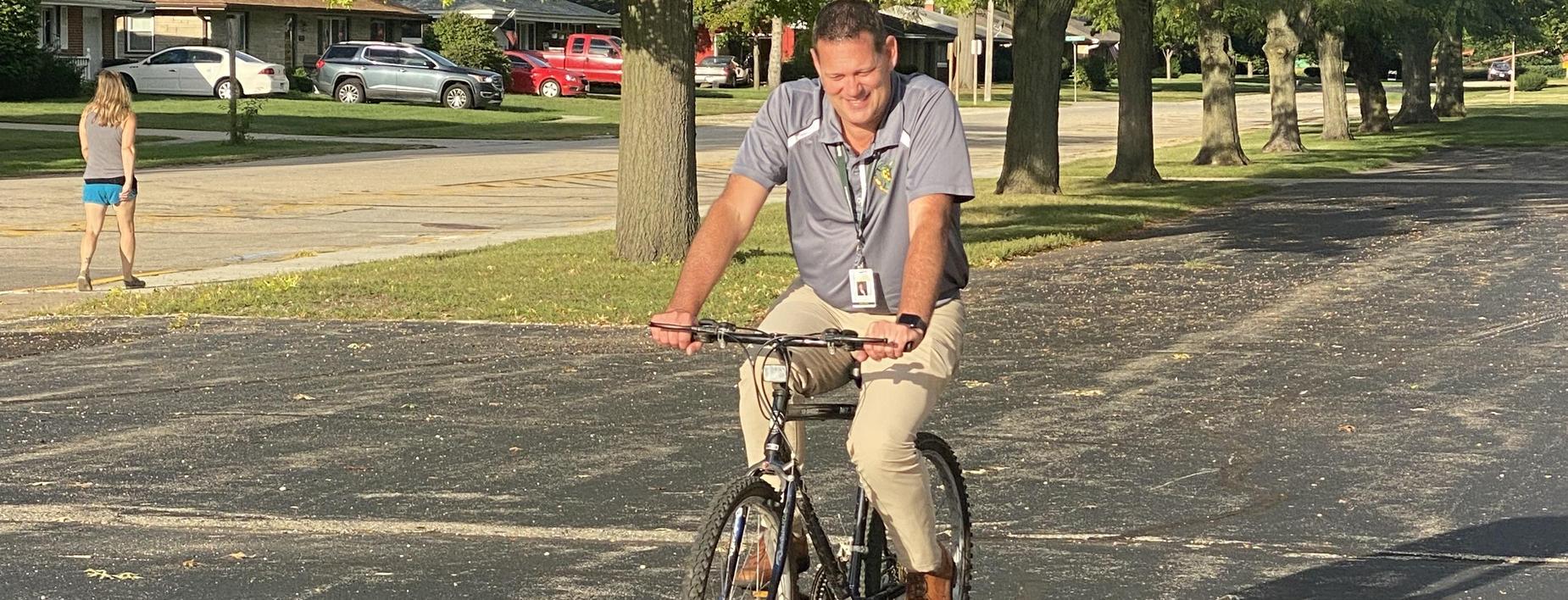 Superintendent Spencer making the rounds on his bike