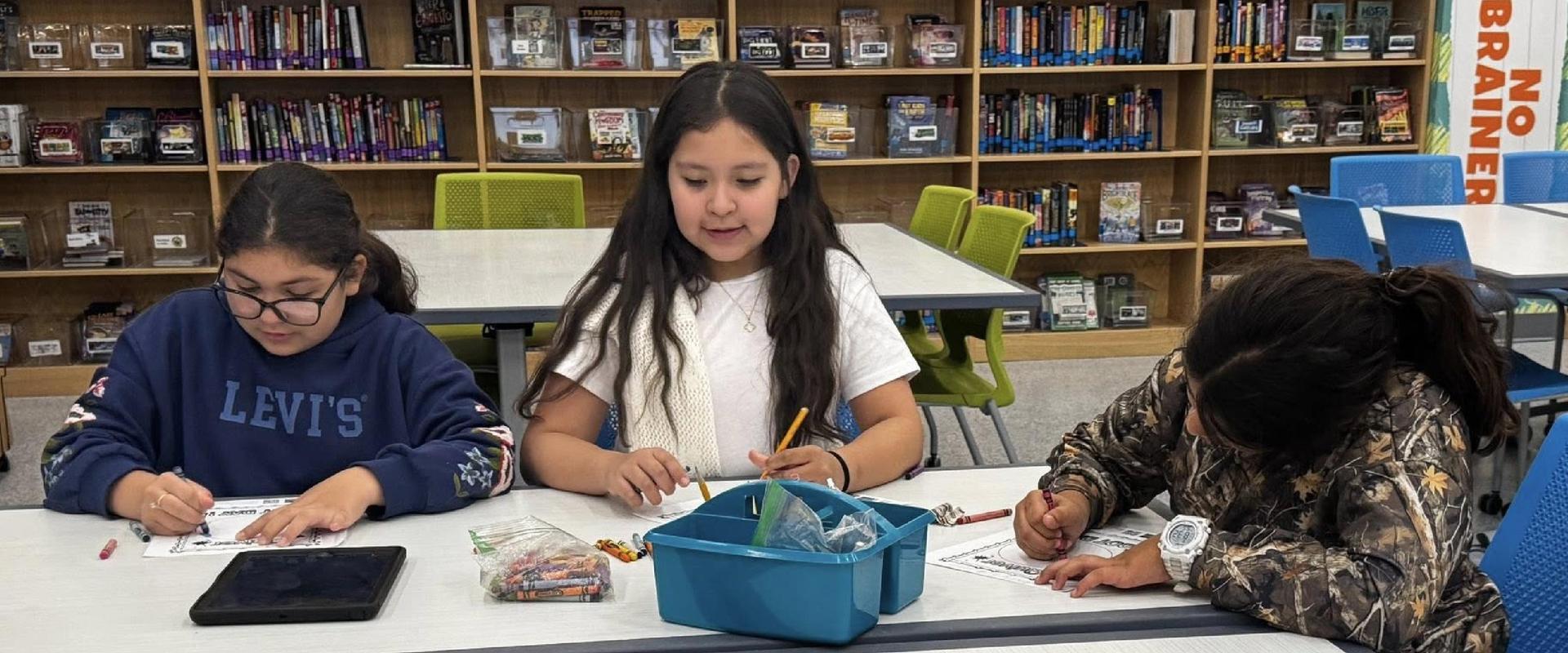 Children reading in the library