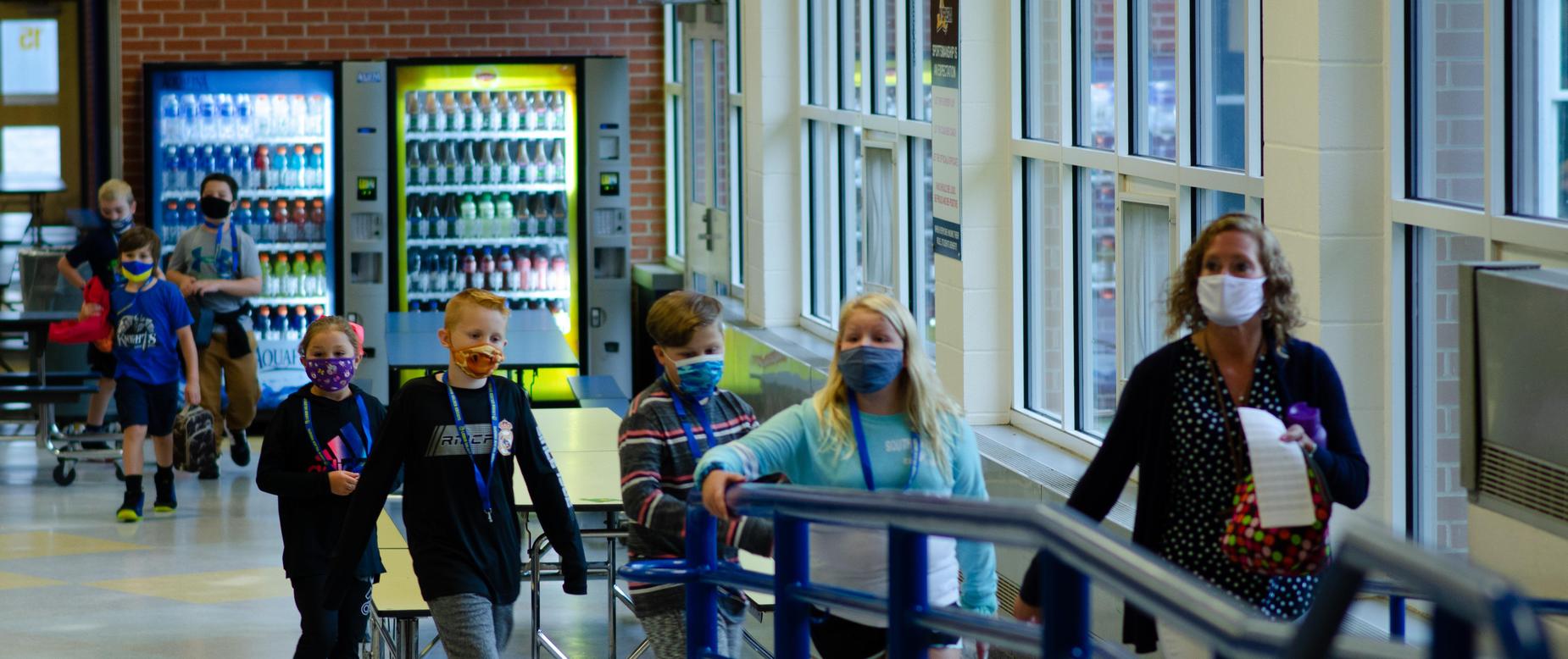 students walking in the hallway