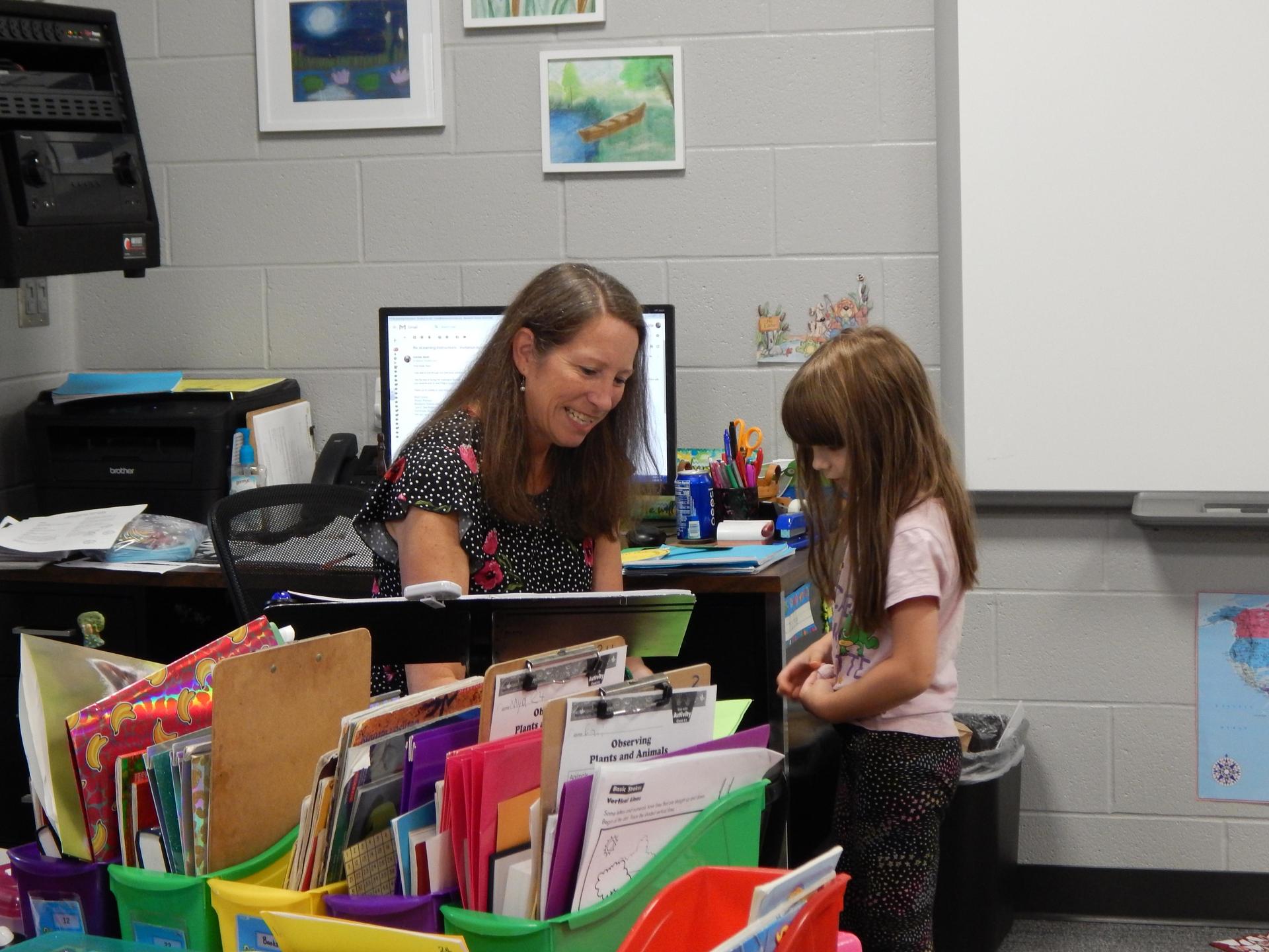Teacher with students