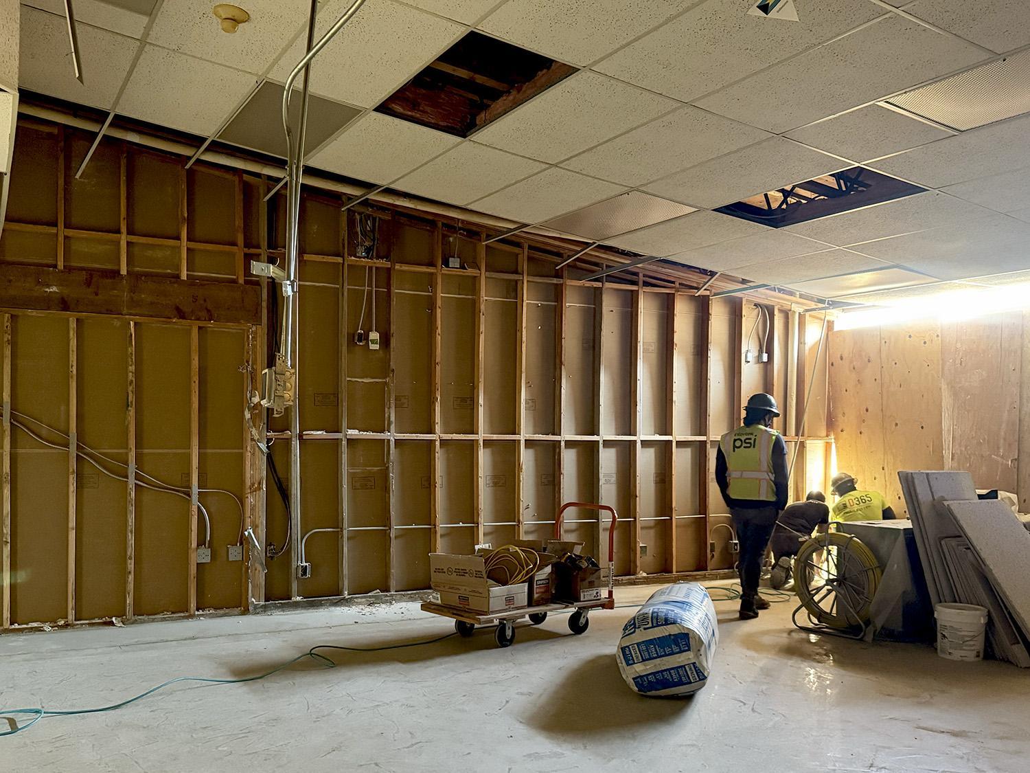 adding conduit and cabling to exposed wall