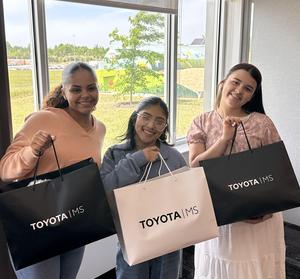 Three girls with their goody bags