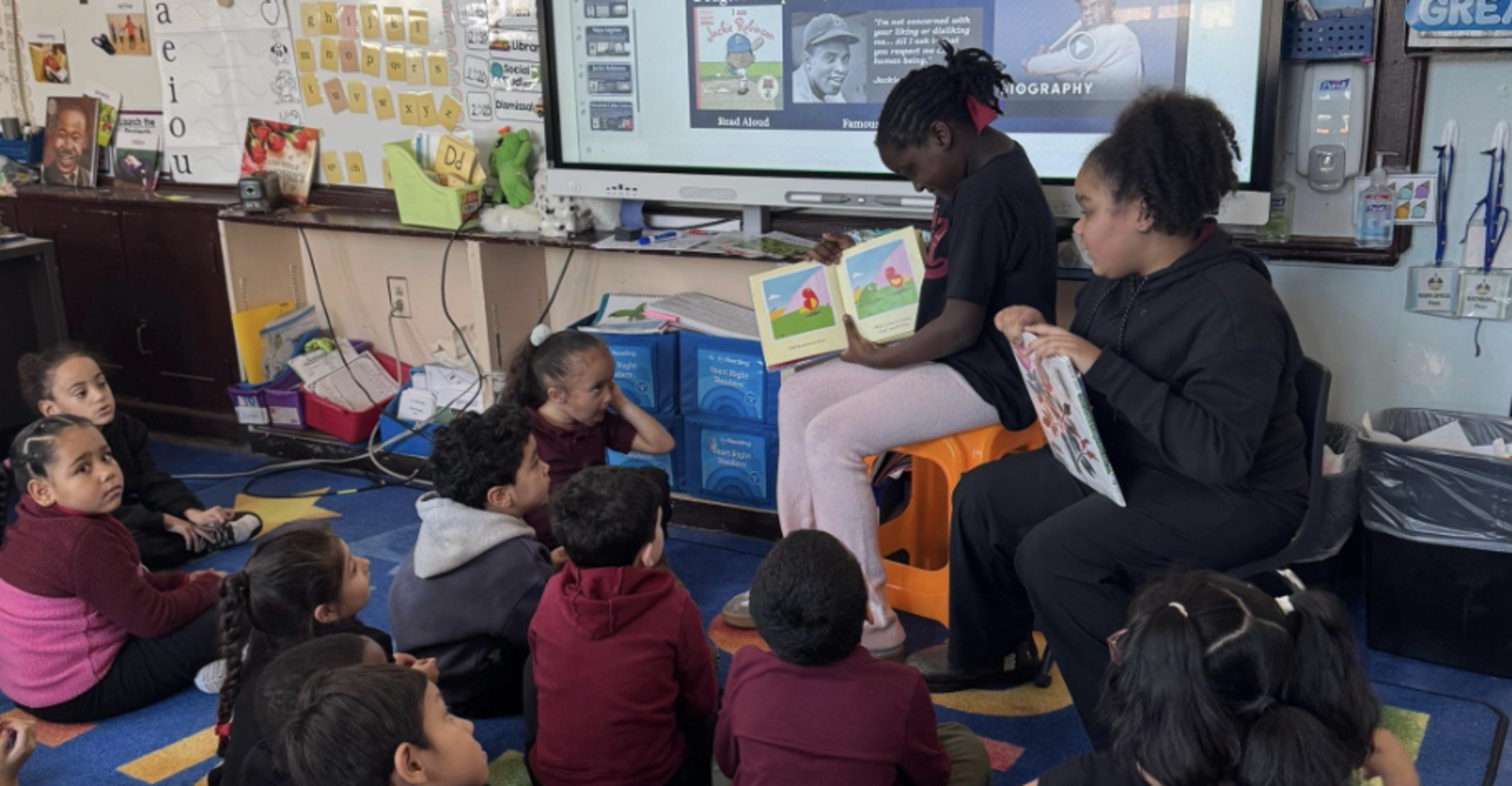 Our fifth graders reading to our first graders