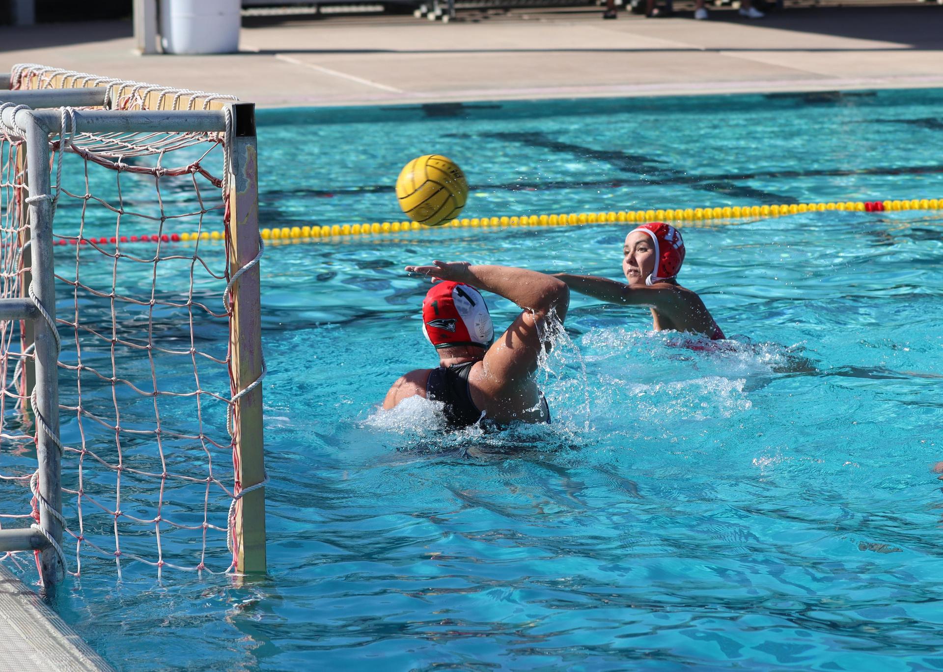 girls playing water polo against Hoover