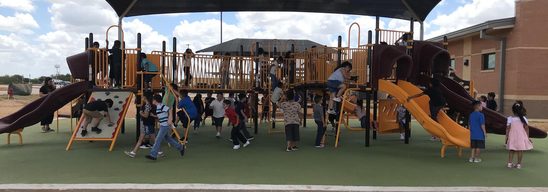 rbe students playing on new playground
