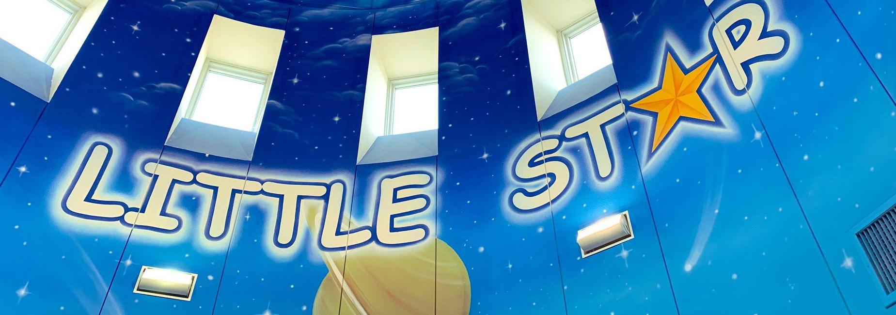 mural of a starry sky reads little star