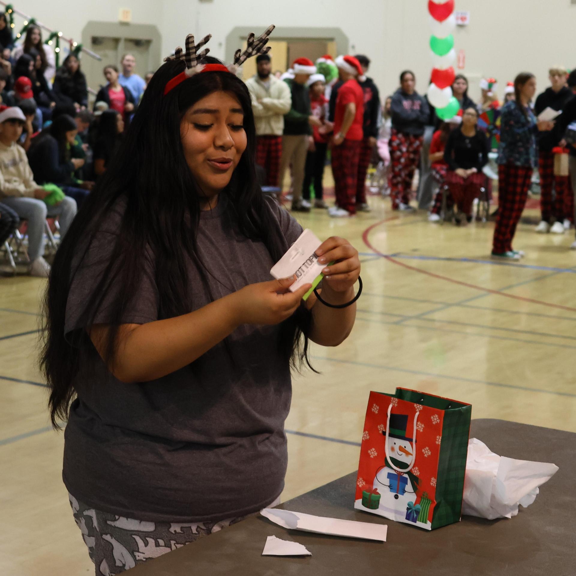 students receiving gifts