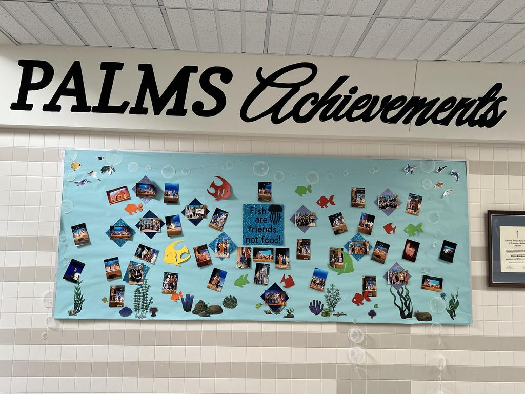 The "PALMS Achievements" poster in the hallway.