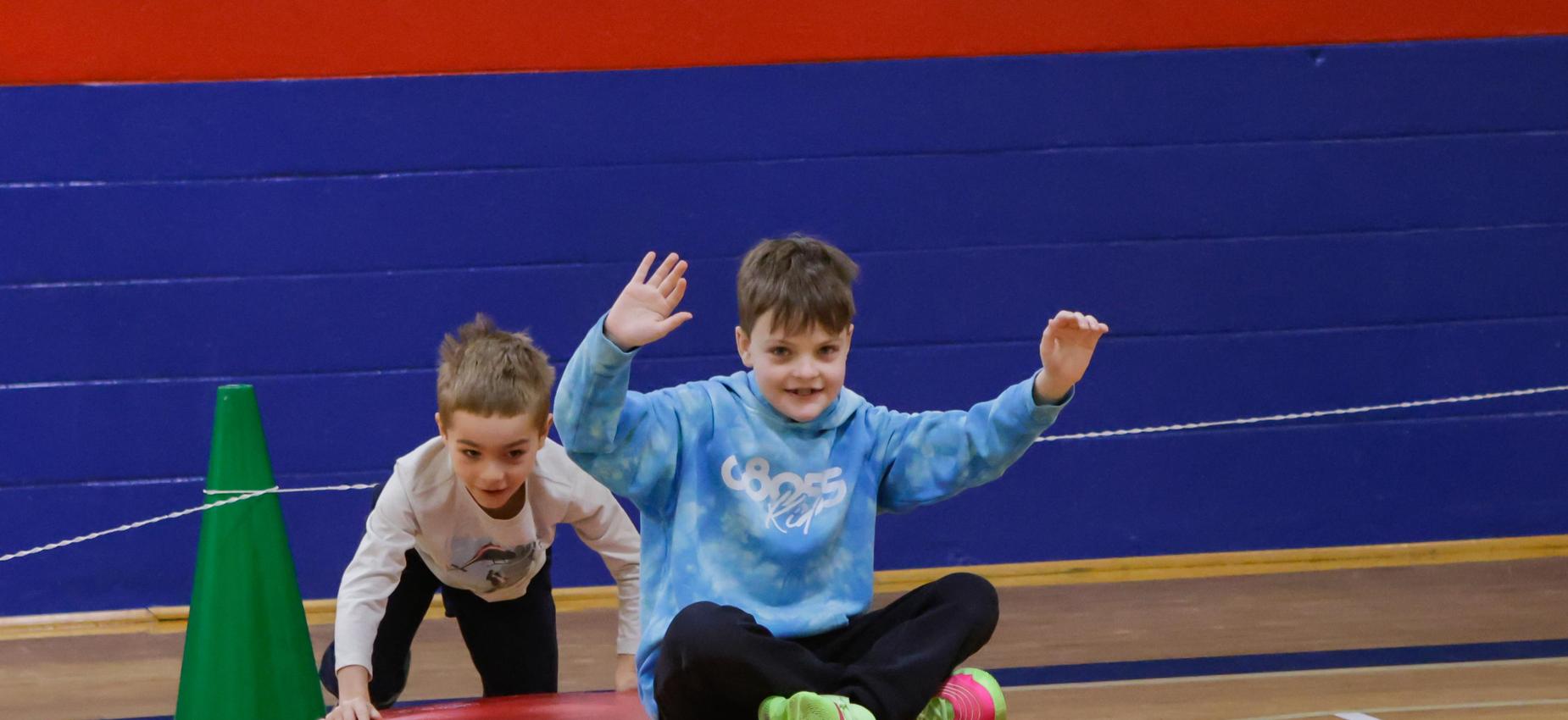 Two boys having fun during PE at Taunton Forge.