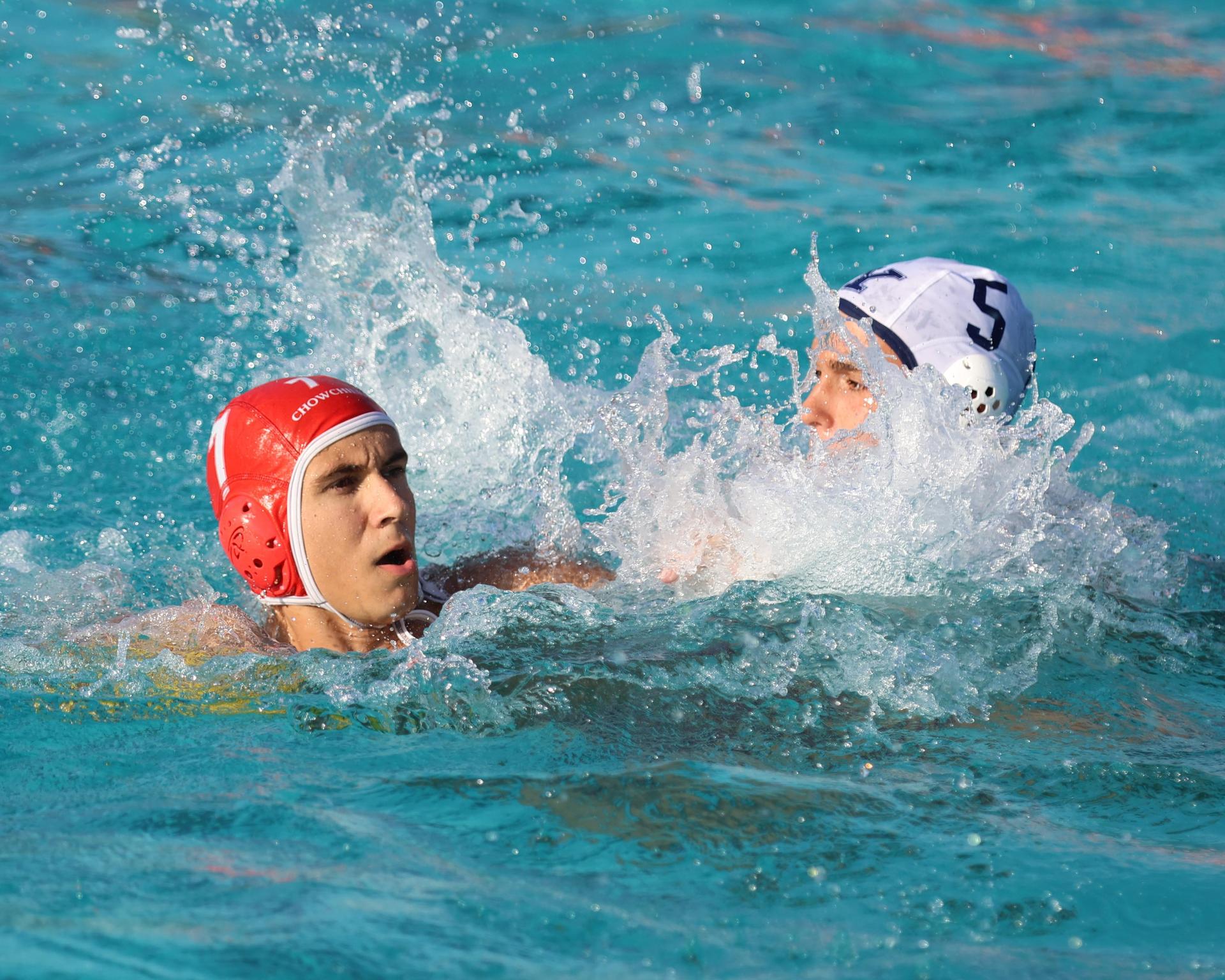 Boys playing water polo against Yosemite