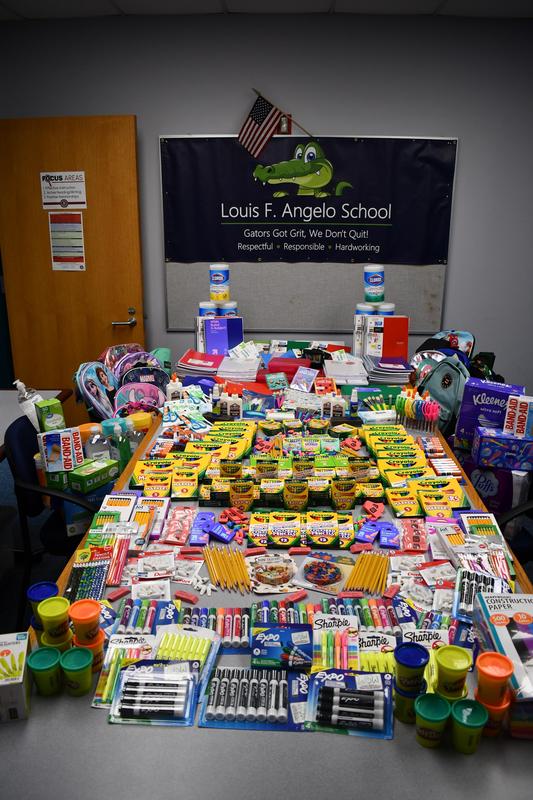 School supplies fill a table at the Angelo School
