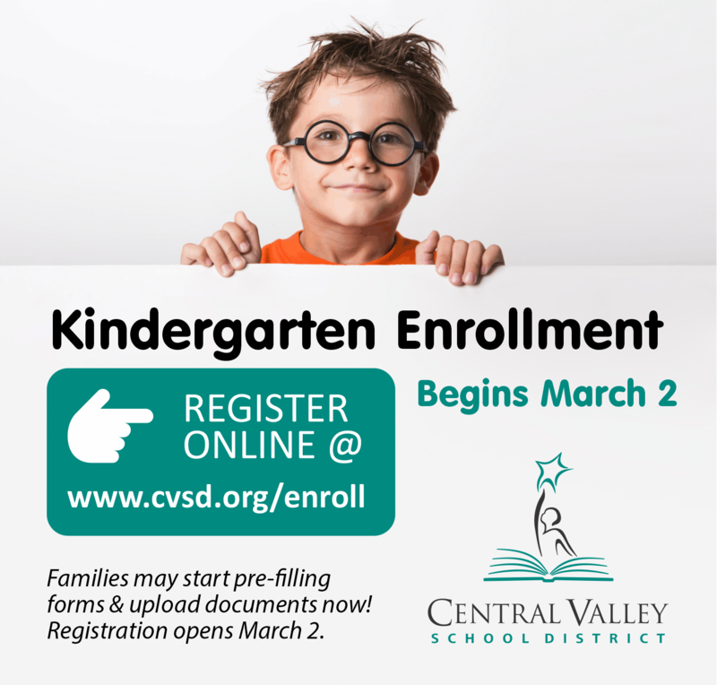 Small boy holding sign with cvsd.org/enroll