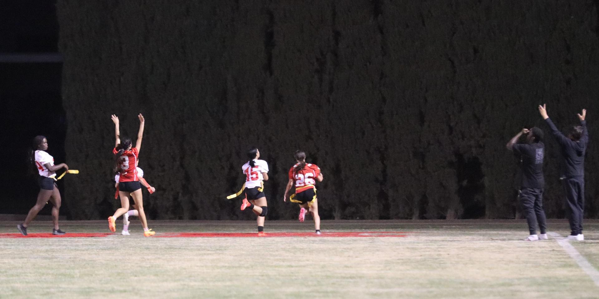 girls playing flag football