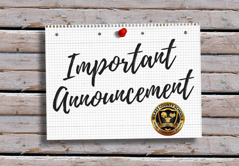 Announcement on grid paper pinned to a wooden surface.