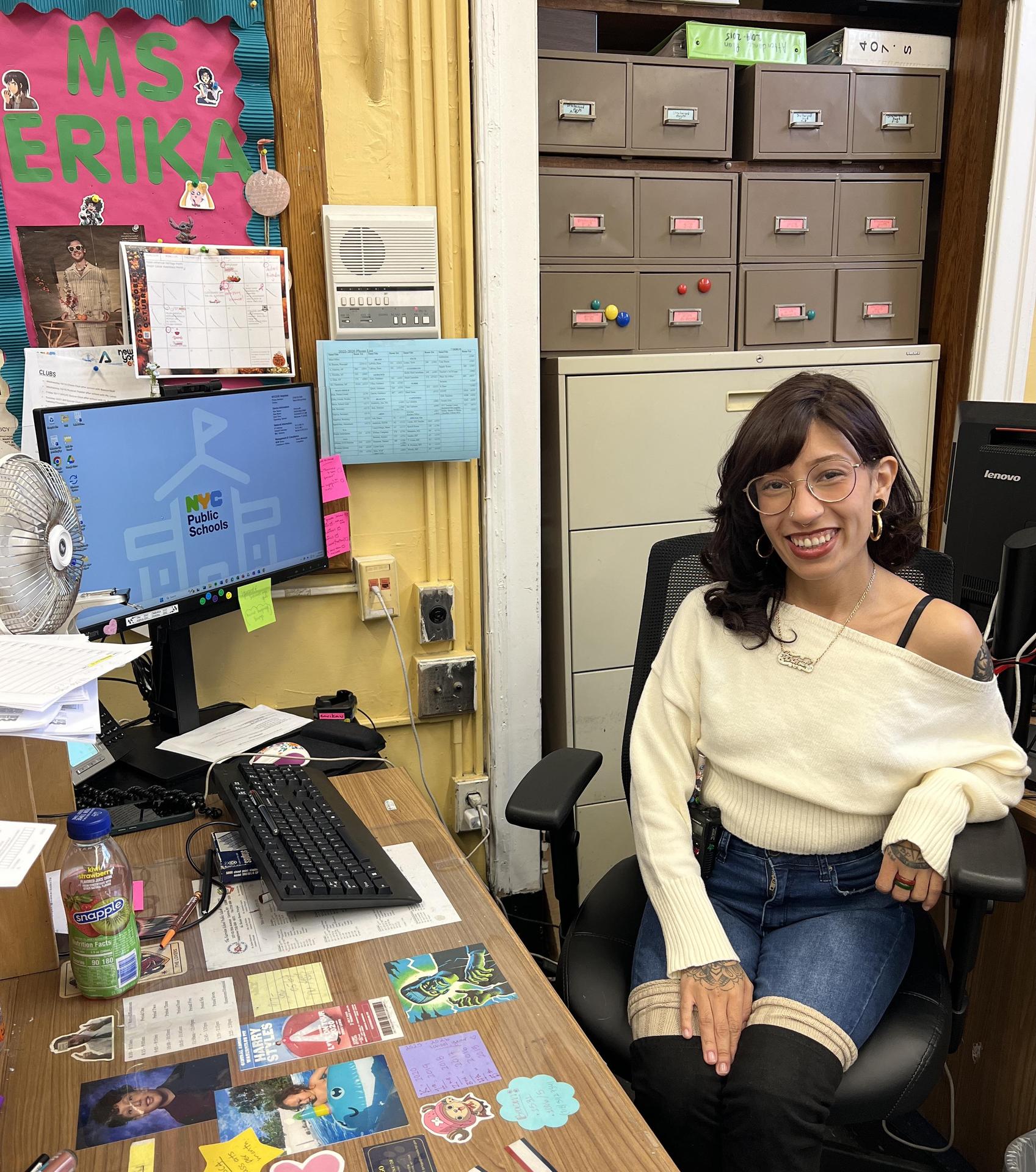 woman sitting at her desk