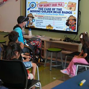 instructor give direction about an "escape room" activity