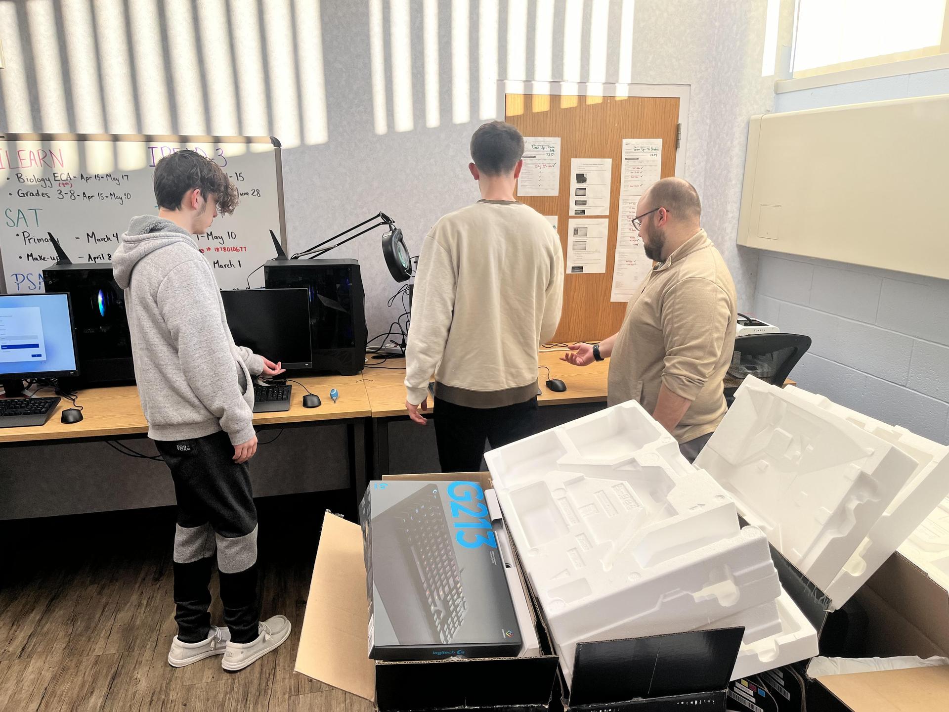 Tech Tribe students working or learning