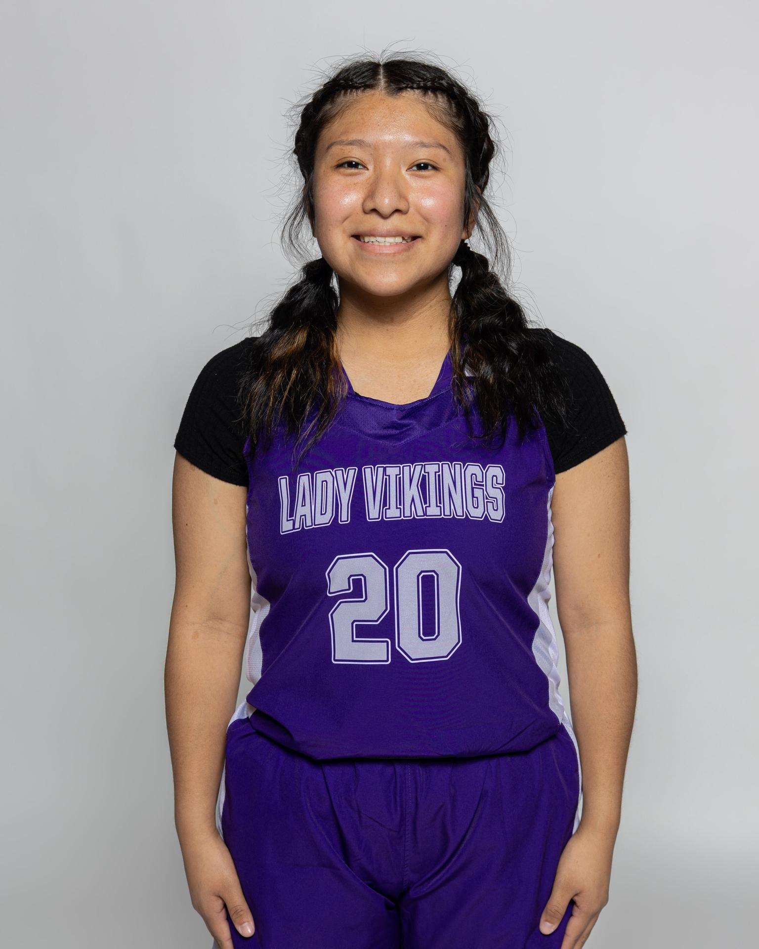 Female player number 20 posting for the roster