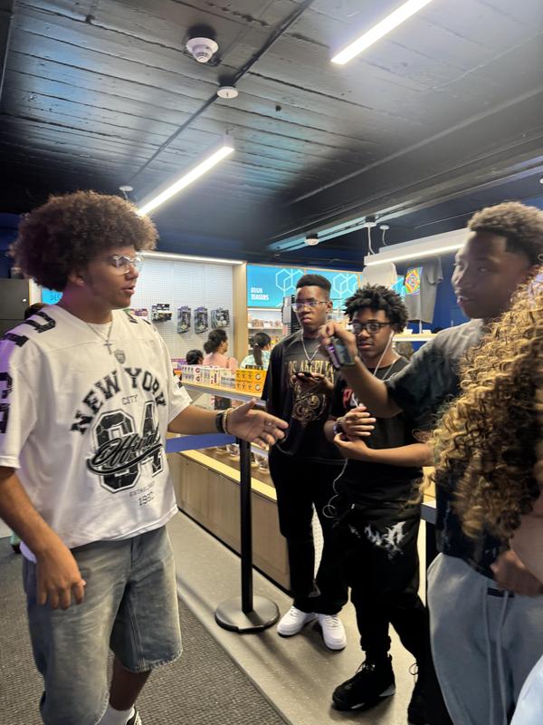 Cayden chats with fellow students