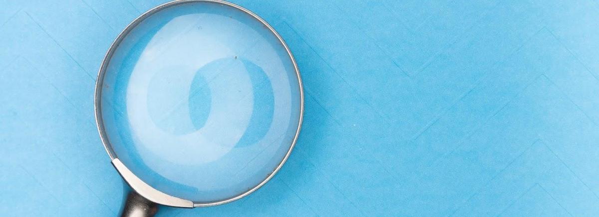 magnifying glass on blue background