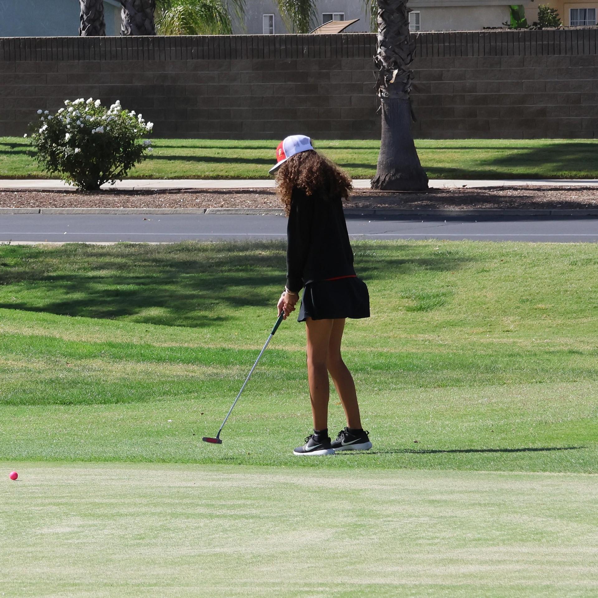Girls golfers in action at the championships