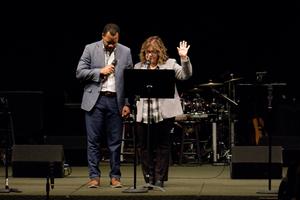 Faculty members praying