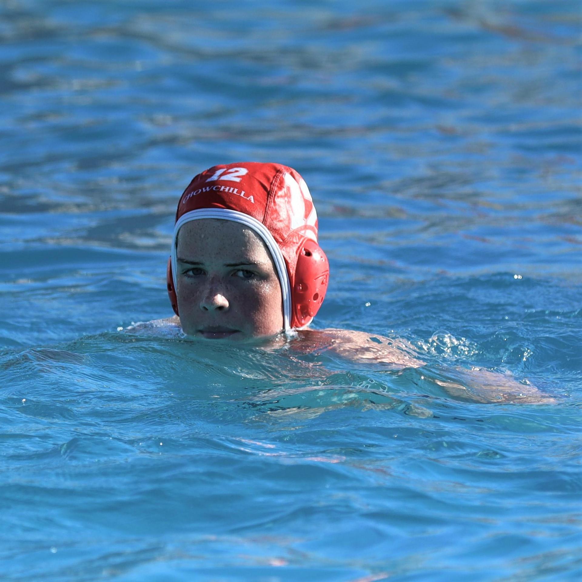 boys playing water polo against Madera