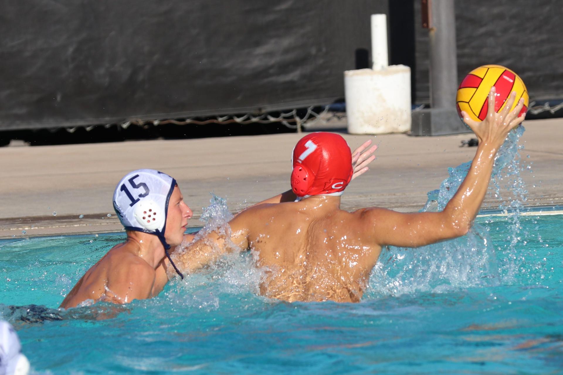 Boys playing water polo against Yosemite